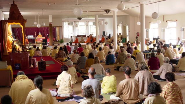 Practising yoga techniques with Vishwaguruji